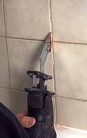 effective grout removal, grout grabber, remove tile grout, reciprocating saw, replaceable blades, carbide grit coated blades, remove damaged grout, removed mildewed grout, correct grout grabber blade thickness