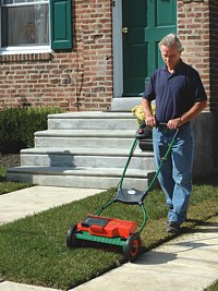 Mantis reel mower, mantis cordless push reel mower, battery operated reel mower, mower powered by a 24 volt battery, cordless electric mower, environmentally friendly lawn mower, low maintenance lawn mower, precise lawn cutting, manicured lawn, pollution free lawn mower