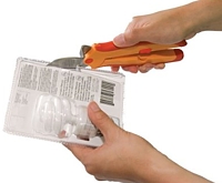 Open It! is a tool for opening clamshell packages. open it!, open it, clamshell packages, plastic packaging, package opener tool, sealed packages, Zibra