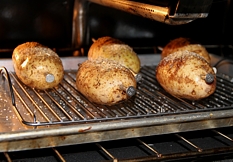 Potatoes in oven with Spud Spikes