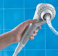 moen massaging showerhead, moen revolution massaging showerhead, moen handheld showerhead, moen hand held massaging shower, user friendly handheld showerhead, accessible housing, two showerheads in one, normal showerhead, freedomdial, freedom dial, ergonomically designed handheld shower, 3m safety walk indoor/outdoor tread, contoured shower handle, water flow, water texture, the perfect shower, rain-like shower, deep therapeutic massage, water pattern